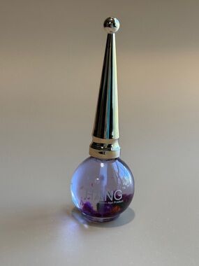 Purple Decorative Bottle Accent with Silver Top